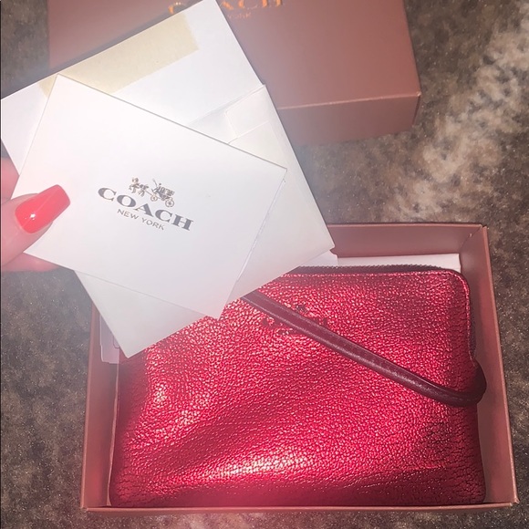 Shiny red coach wrist wallet